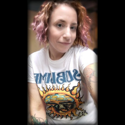 selfie women artist sublime music curlyhair tattooed peirced smile